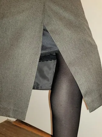 grey pencil skirt with black silky half slip         