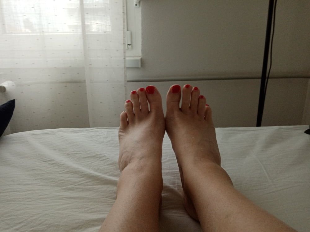 bare smooth slender legs with red painted toes #2