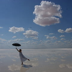 With Black umbrella on White Salt