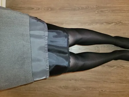 grey pencil skirt with black silky half slip         