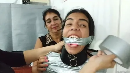 heavily duct tape mummified by crazy bondage women         