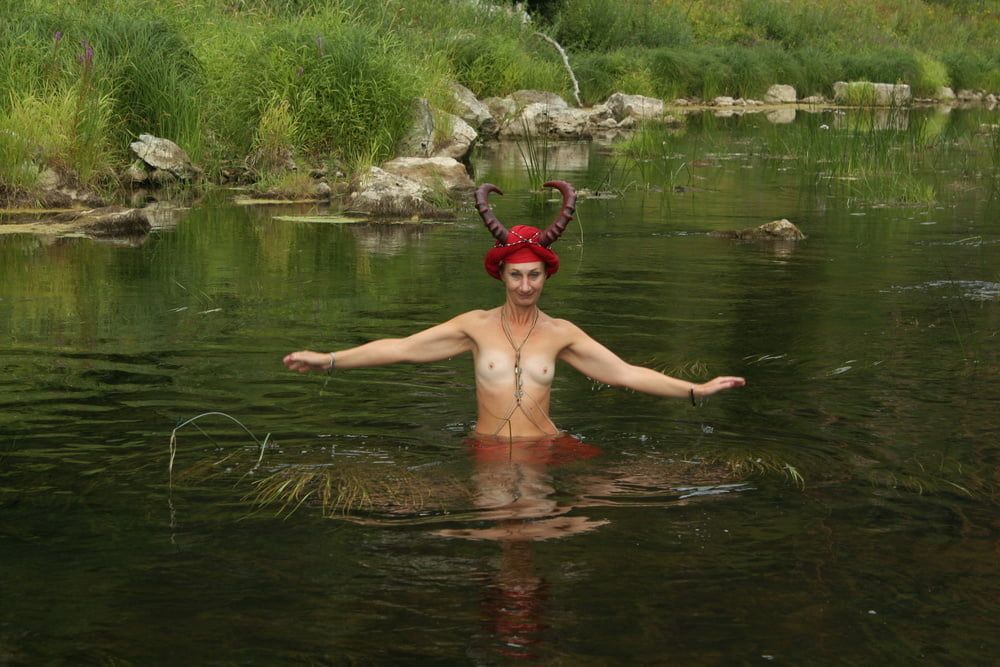 With Horns In Red Dress In Shallow River #52