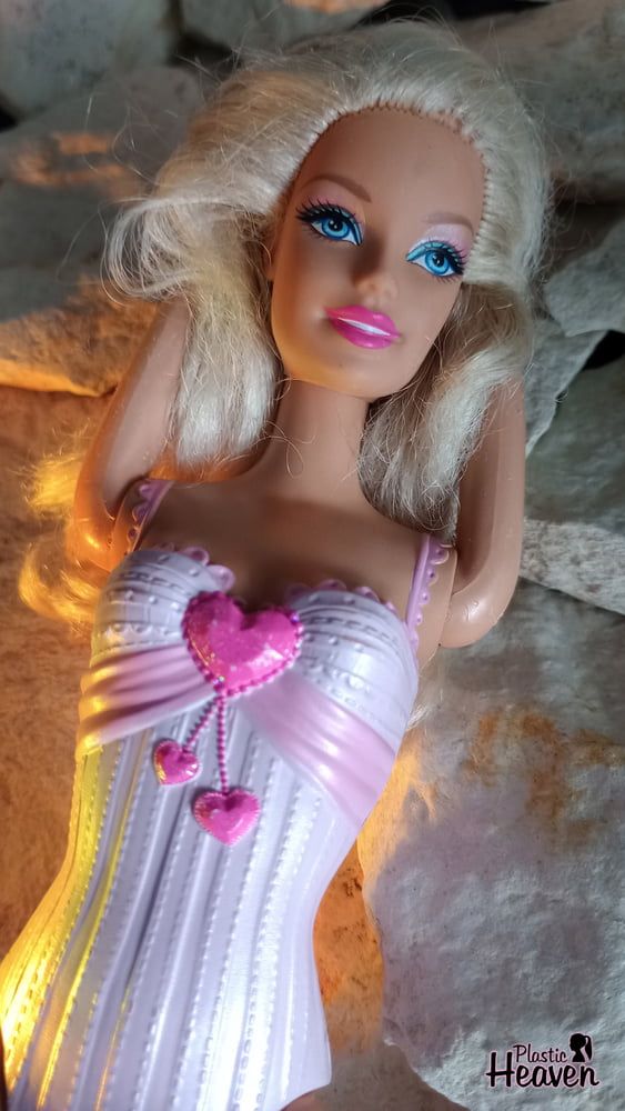 Barbie sunbathes after swimming in the ocean #4