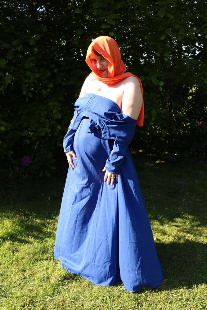 hijab and abaya flashing outdoors #30