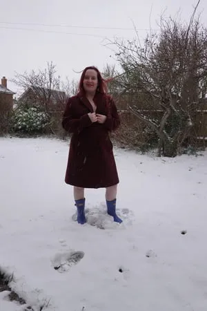 pregnant flashing naked in the cold snow         