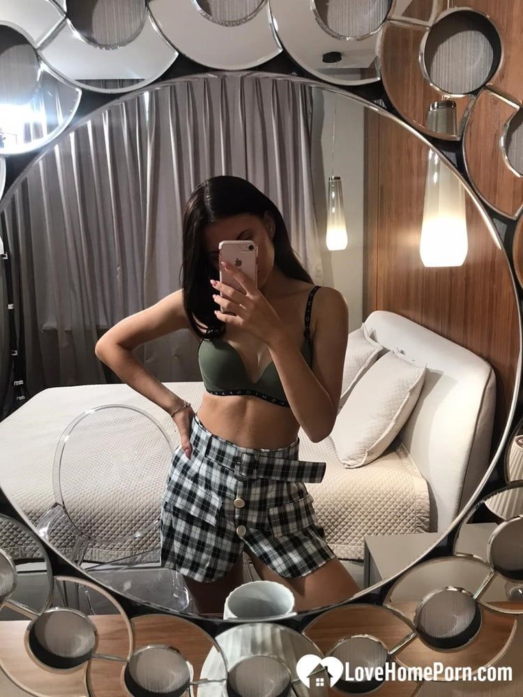 Hot schoolgirl reveals her tits in the mirror #21