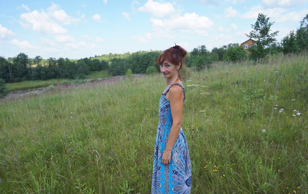 In blue dress in field #32