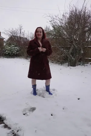 pregnant flashing naked in the cold snow         