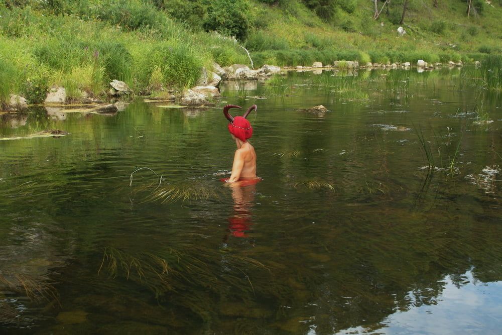 With Horns In Red Dress In Shallow River #55