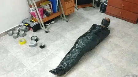 extreme triple layered duct tape mummification         