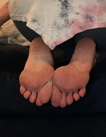 closeups dirty clean soles and toes         