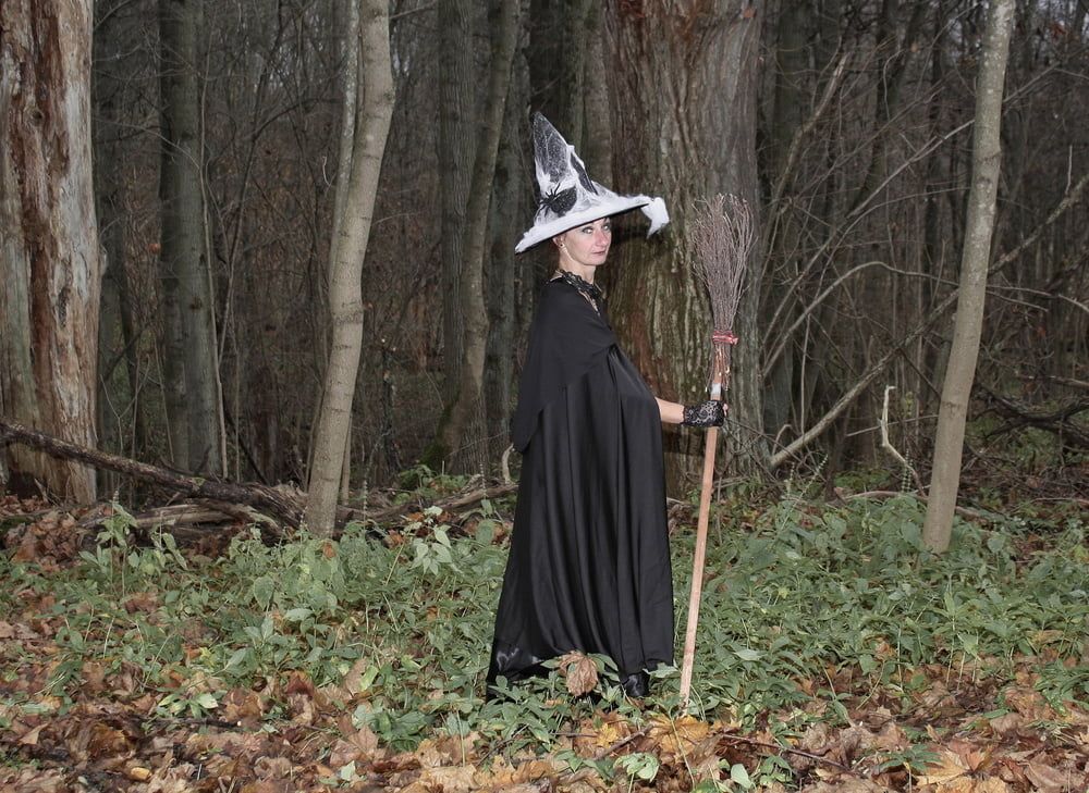 Witch with broom in forest #43
