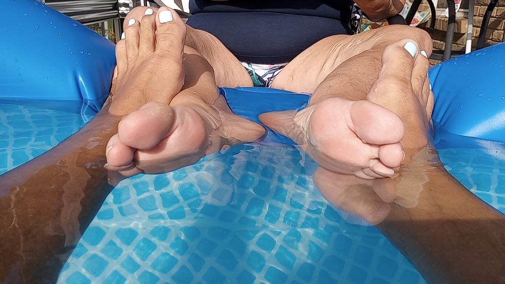 Playing footsie in the pool #11