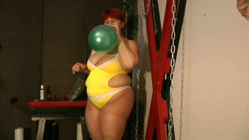 Balloon fun in a bathing suit #23