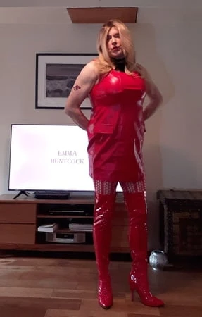 sissy in red lingerie and thigh boots         