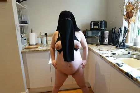 pregnant wife in muslim niqab and nursing bra         