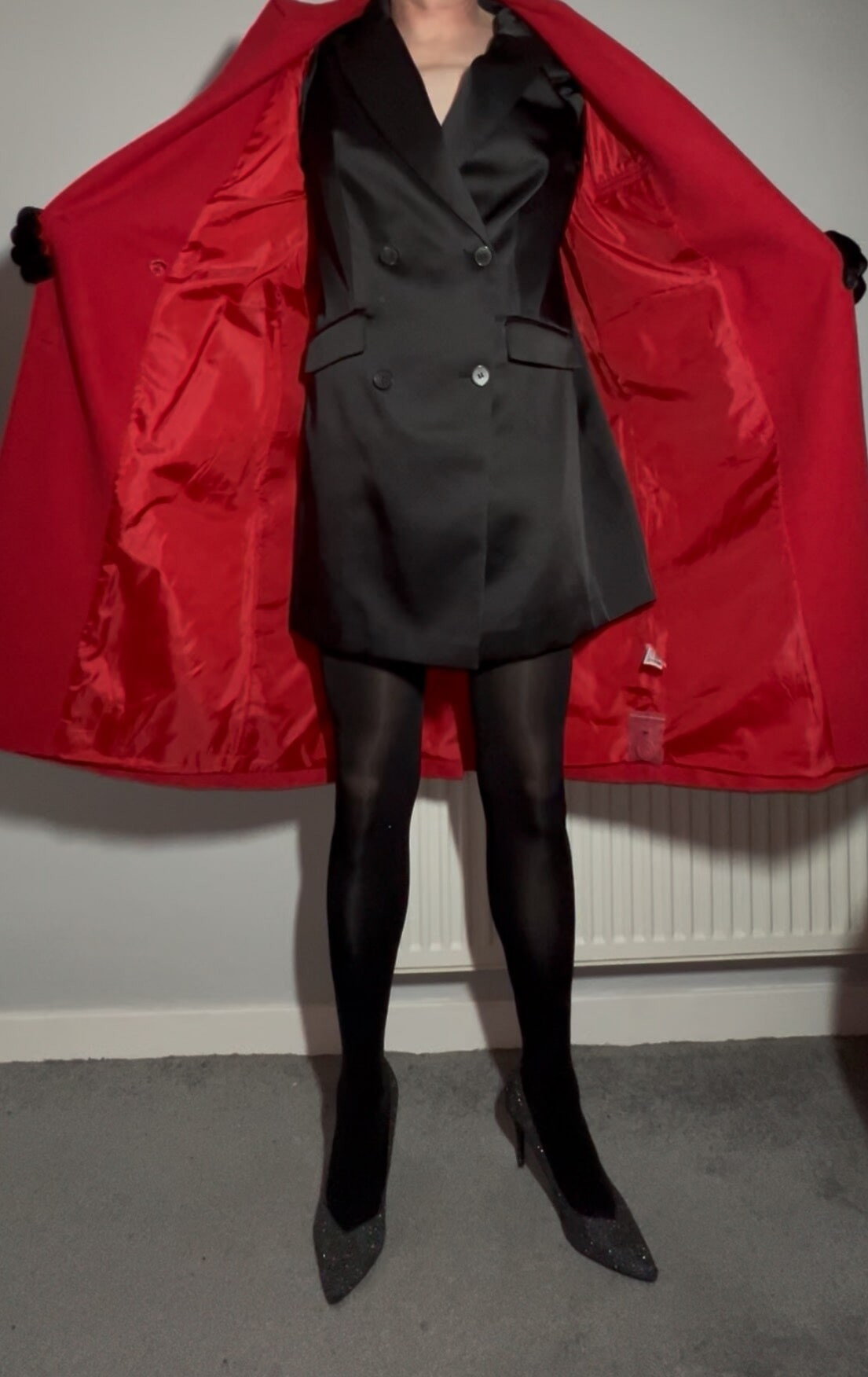 Sissy crossdressing in a black satin blazer dress