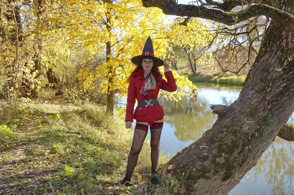 In Hat on Yellow Leaves Background