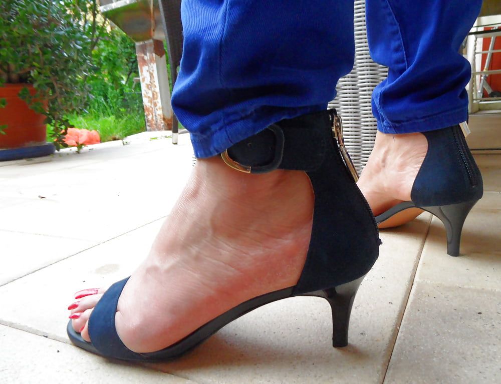 studded high heels of my wife with painted toenails #7