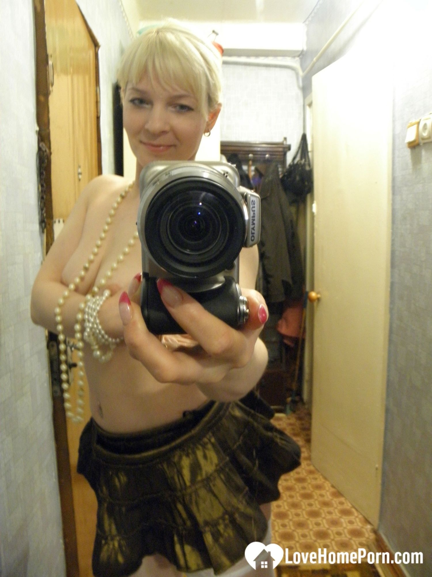 Aroused blonde in stockings taking naughty selfies #20