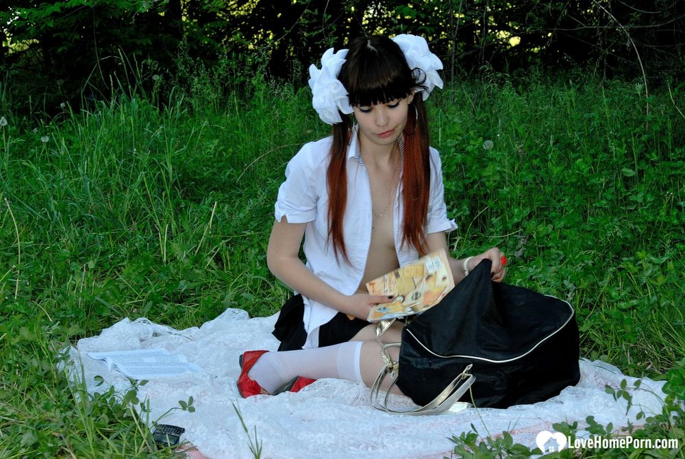 Schoolgirl turns a picnic into a teasing session #12