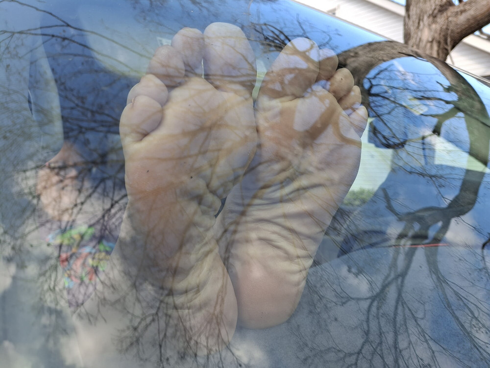Her feet out the window of my truck #12
