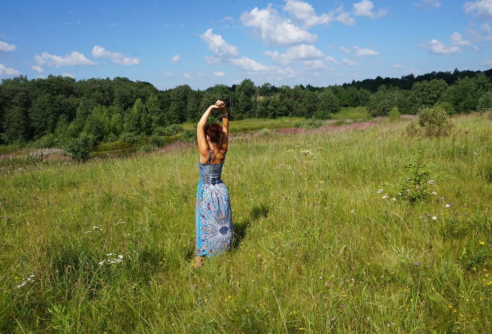 In blue dress in field #20