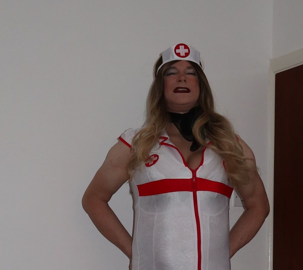 slutty looking nurse in red fishnet stockings #8