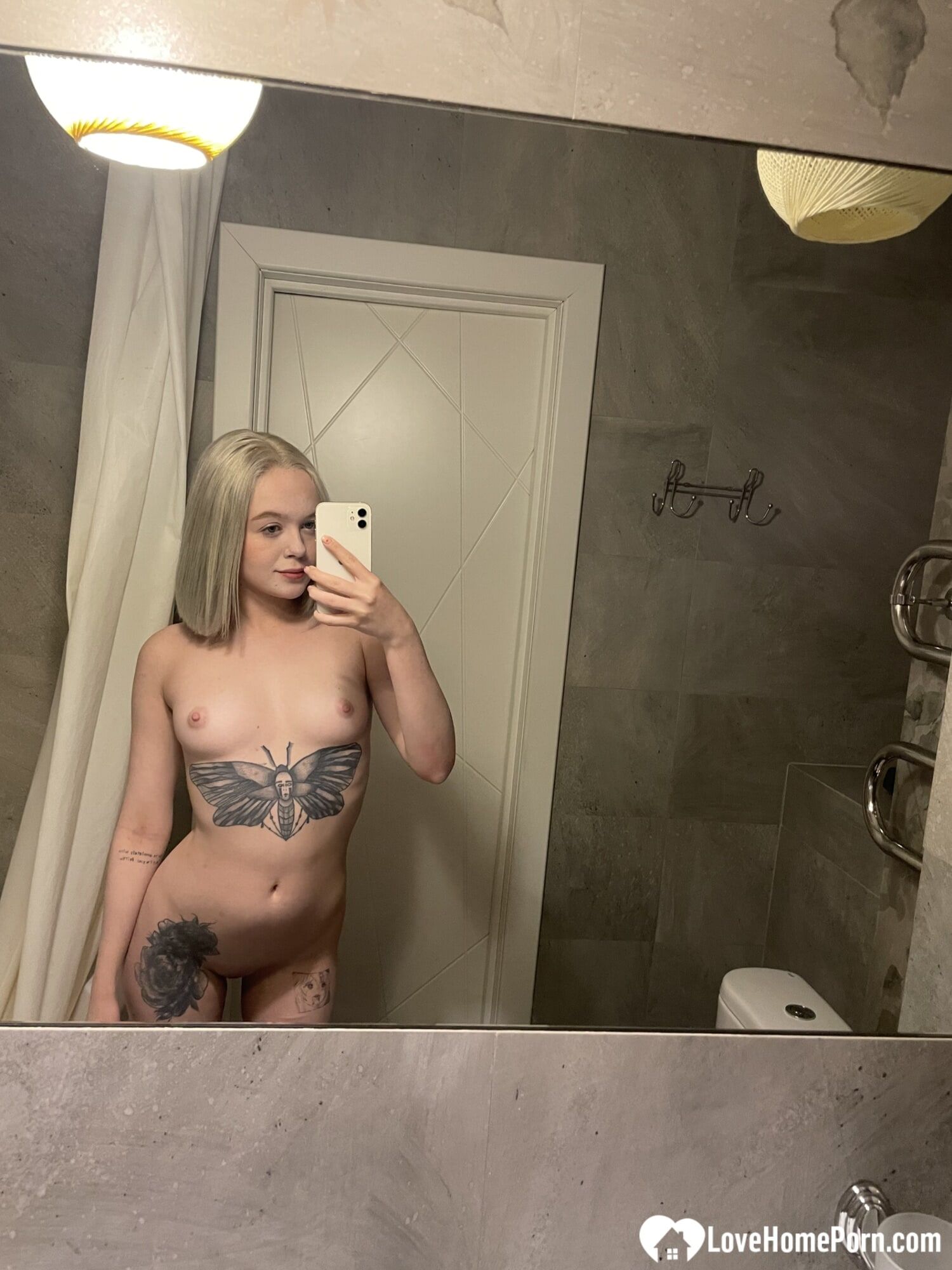 Tattooed blonde showing off her sexy tattoos #41