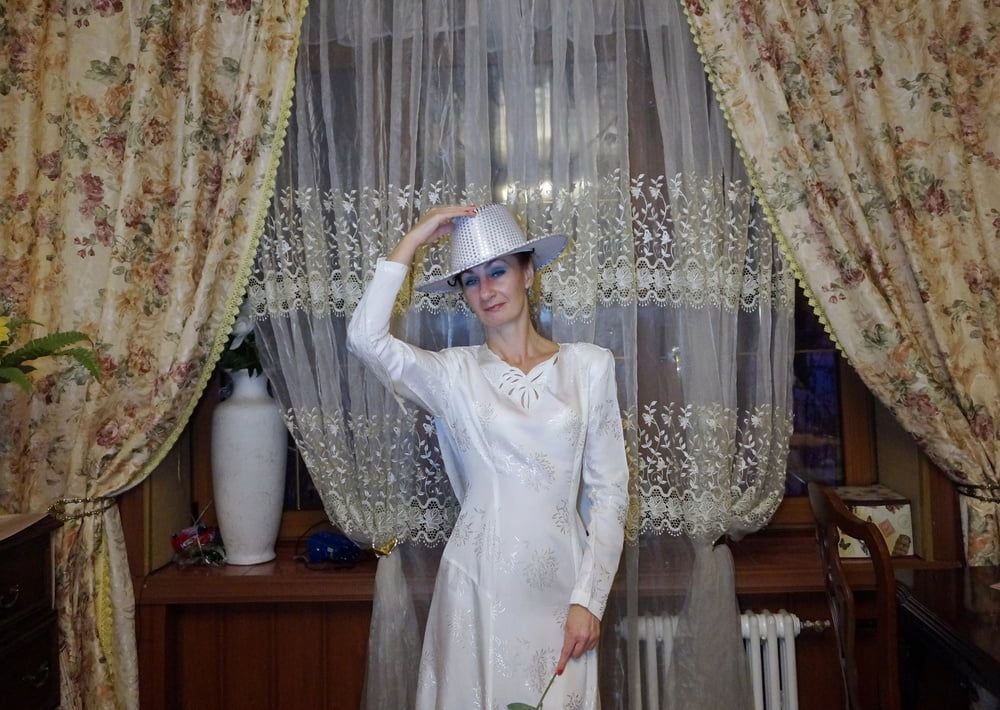 In Wedding Dress and White Hat #32