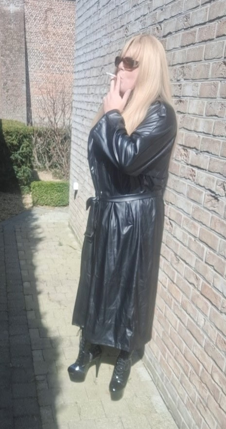 Smoking in black coat #13