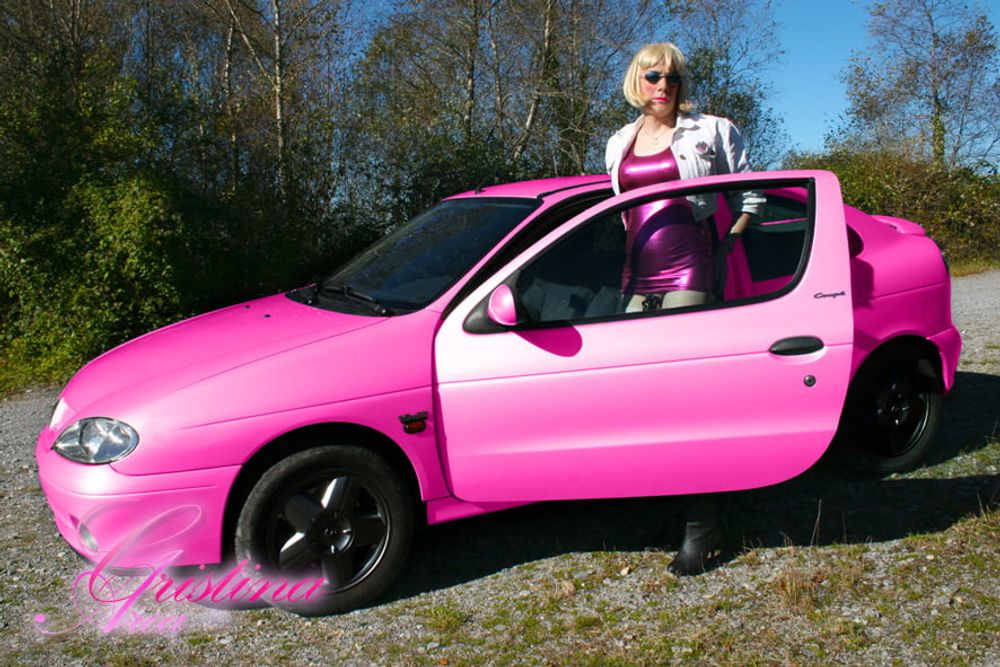 Slutty sissy in a photoshoot with her car... #22