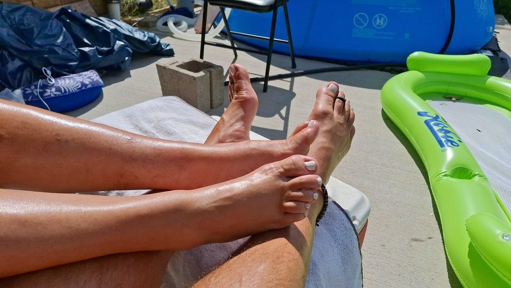 Tanning our legs and feet #9