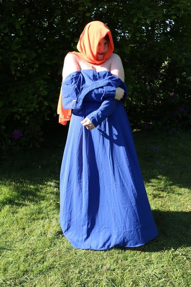 hijab and abaya flashing outdoors #37