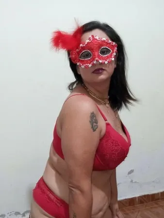 showing off wearing red lingerie         