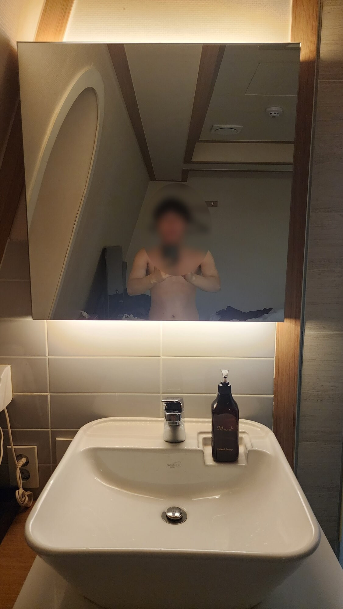 In front of the sink