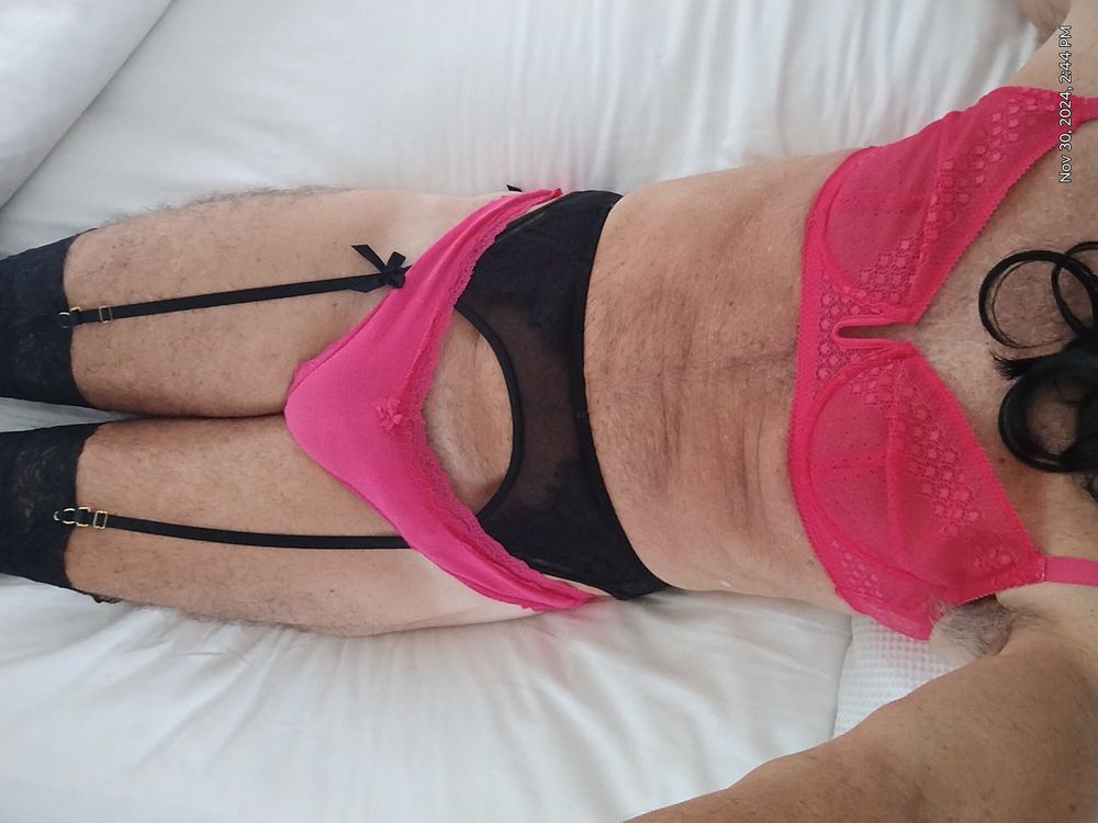 Crossdresser in new pink panties and bra 