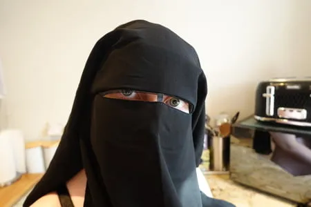 pregnant wife in muslim niqab and nursing bra         