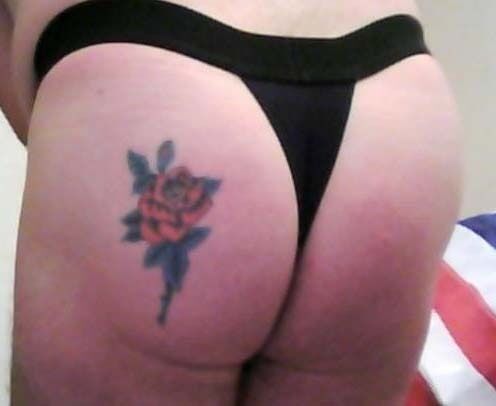 MY HOT AND SEXY ASS WITH A SEXY TATTOO ON A LEFT ASS.