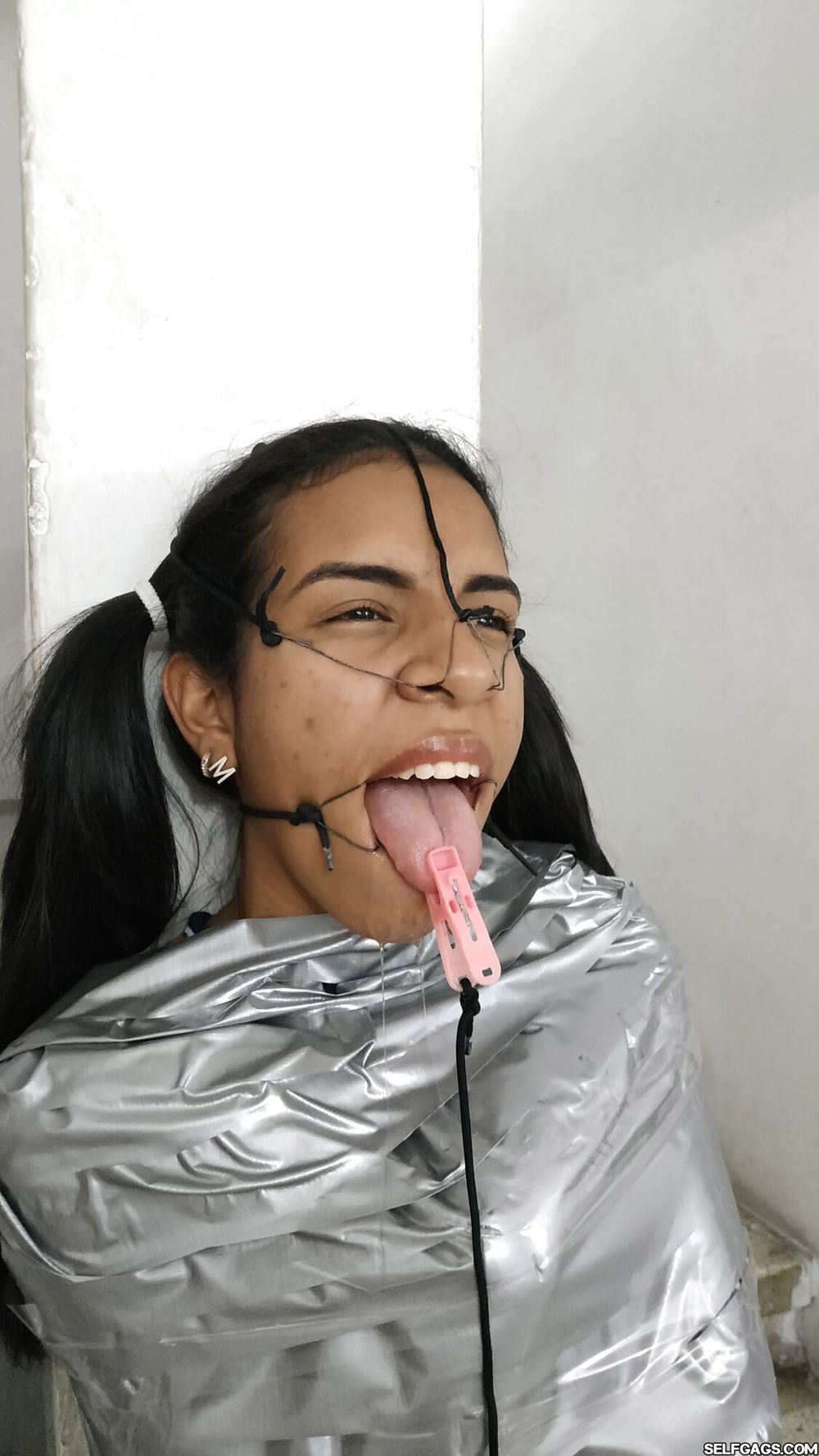 Mummified Latina Slut Mouth Hooked And Helpless #2