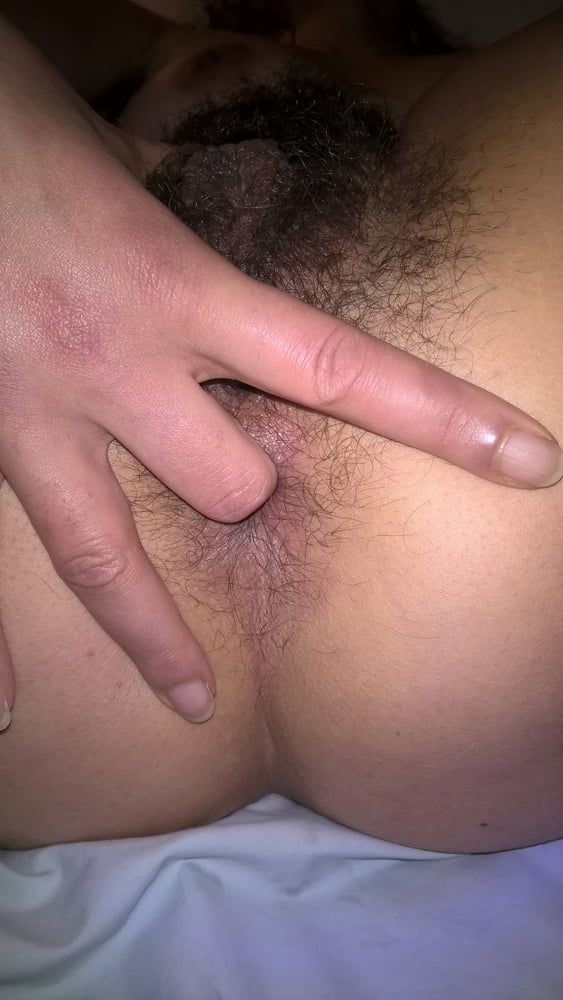 My beautiful wife fingering her hairy ass