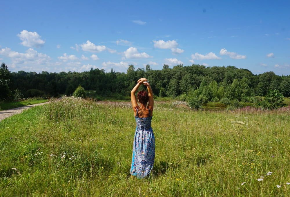 In blue dress in field #22