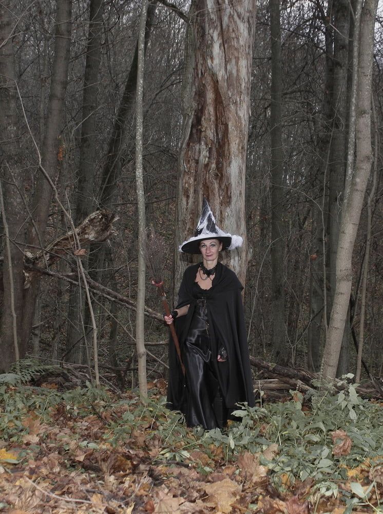 Witch with broom in forest #27