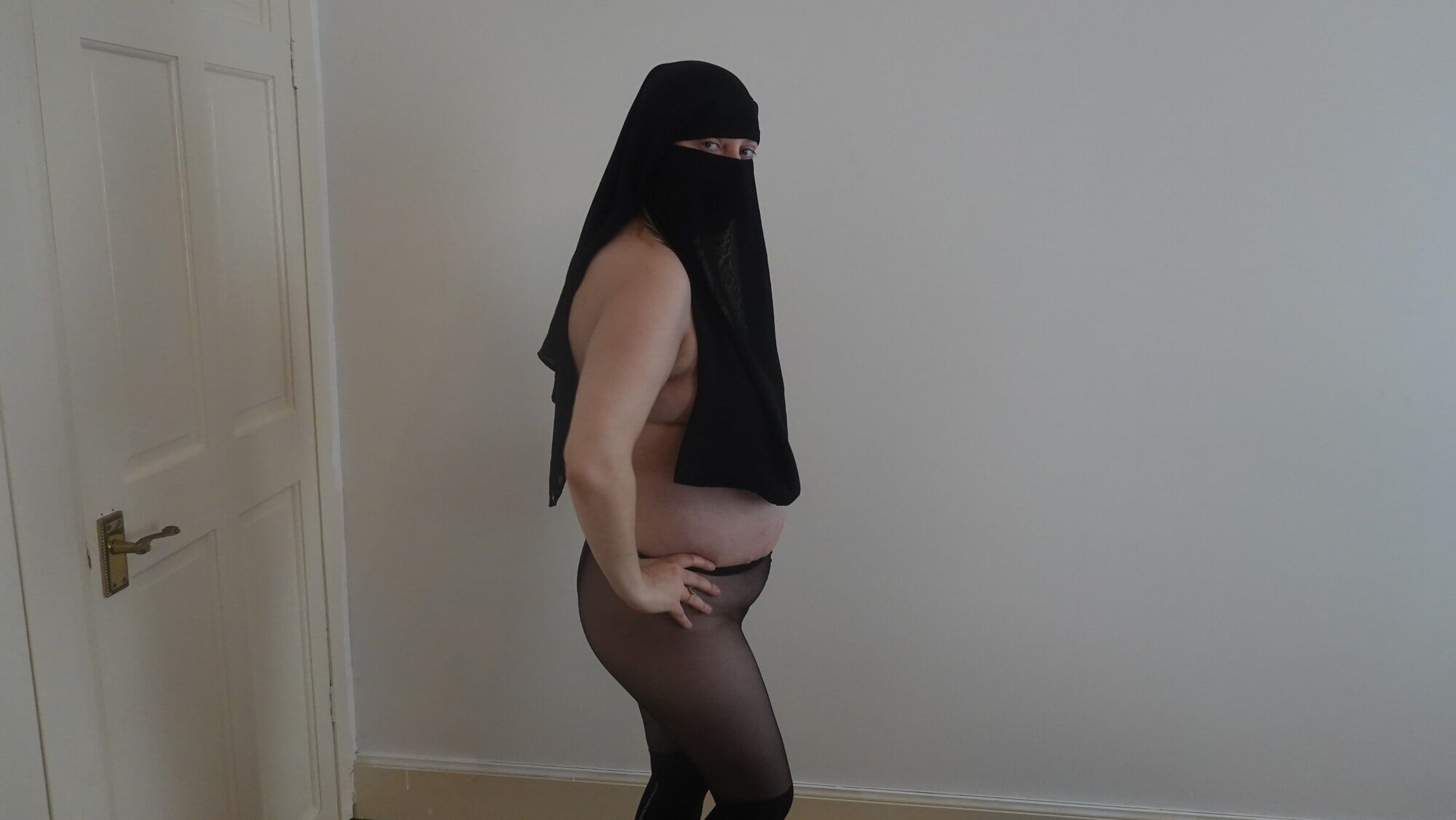 Wearing Shorts and pantyhose in Niqab  #25