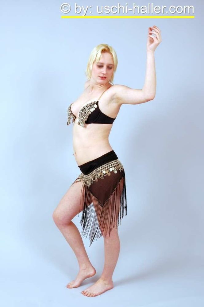 Photo shoot with blonde cum slut Dany Sun as a belly dancer #11