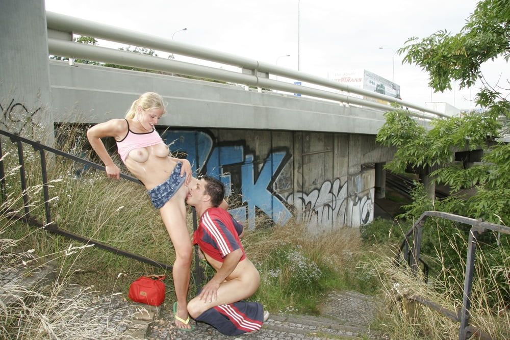 Two young exhibitionists enjoy fucking around the city #27