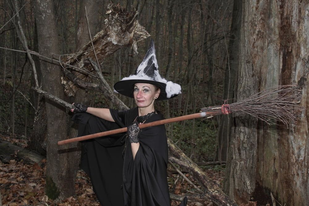 Witch with broom in forest #31