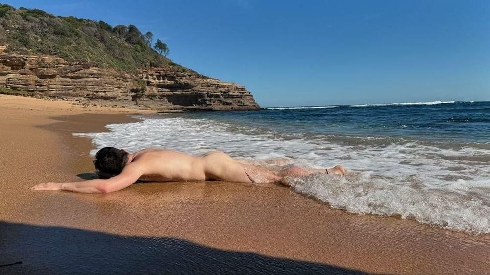 Flroian Johannes Mueller nude at the beach #8