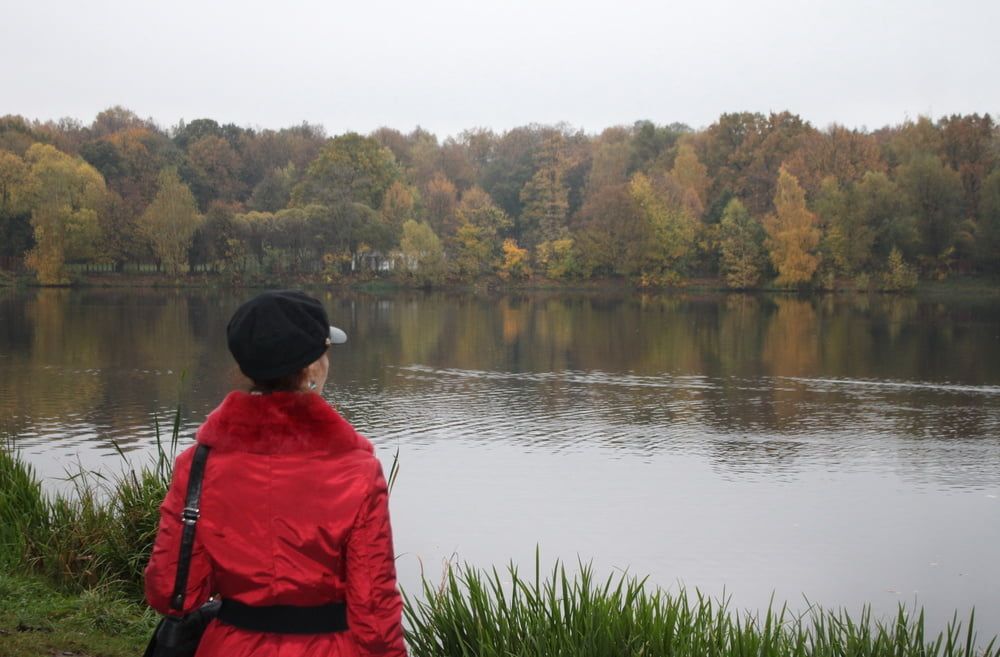 red jacket and yellow leaves