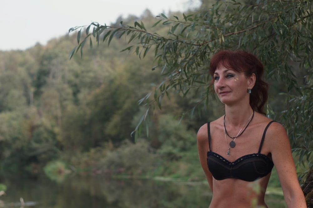 Black bikini near tree upon river #12